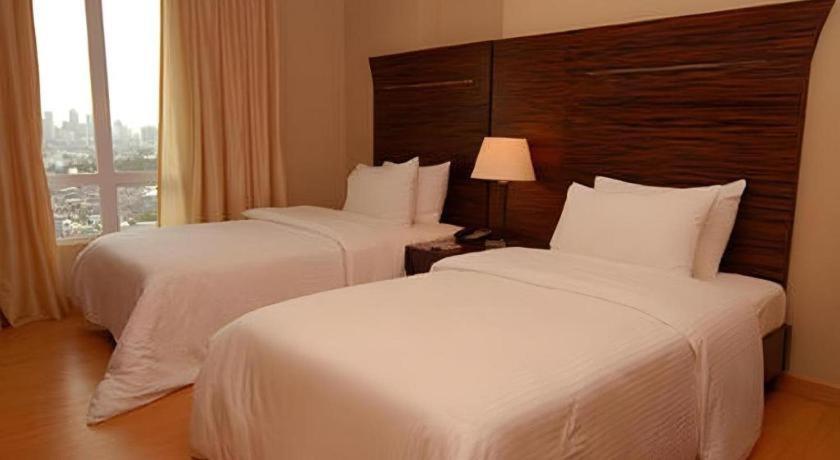 Lancaster Hotel Manila Мандалуйонг Экстерьер фото